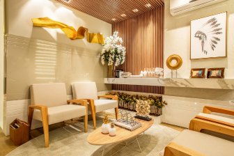 Modern waiting area with sleek chairs and a coffee table, showcasing Greater Mansion's design in Brooklyn.